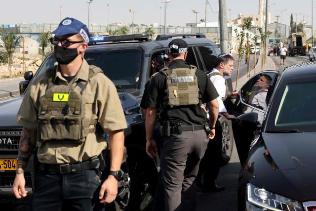 Far-right Israeli Finance Minister Bezalel Smotrich visits the scene of an earlier fire exchange between armed Palestinians and Israeli forces following an incident at the norther checkpoint of Hebron in the Israeli-occupied West Bank on October 23, 2026. Israeli troops on October 23 shot dead two suspected Palestinian assailants in the West Bank after a shooting that left at least five people wounded, officials said. (Photo by AHMAD GHARABLI / AFP)