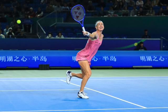 Czech Republic's Marie Bouzkova hits a return to Czech Republic's Sara Bejlek during their women's singles quarter final match at the Ningbo Open tennis tournament in Ningbo, China's eastern Zhejiang province on October 23, 2026. (Photo by CN-STR / AFP) / China OUT