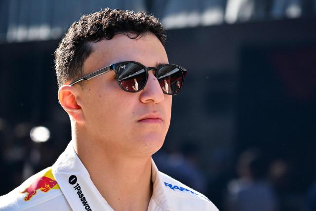 Red Bull Racing's French driver Isack Hadjar arrives in the paddock ahead of the practice session for the United States Formula One Grand Prix at the Circuit of the Americas in Austin, Texas, on October 23, 2026. (Photo by ANGELA WEISS / AFP)