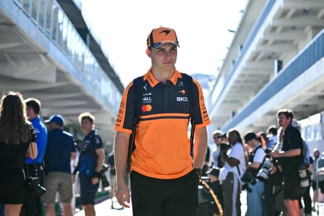 McLaren's Australian driver Oscar Piastri arrives in the paddock ahead of the practice session for the United States Formula One Grand Prix at the Circuit of the Americas in Austin, Texas, on October 23, 2026. (Photo by ANGELA WEISS / AFP)