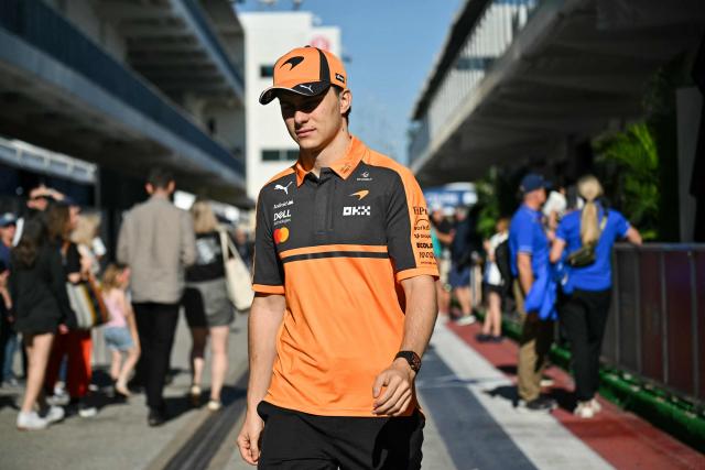 McLaren's Australian driver Oscar Piastri arrives in the paddock ahead of the practice session for the United States Formula One Grand Prix at the Circuit of the Americas in Austin, Texas, on October 23, 2026. (Photo by ANGELA WEISS / AFP)