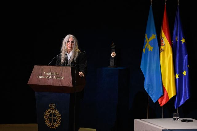 U.S. singer Patti Smith delivers a speech as she receives the 2026 Princess of Asturias Award for the Arts during the 2026 Princess of Asturias Awards ceremony at the Campoamor theatre in Oviedo on October 23, 2026. (Photo by ANDER GILLENEA / AFP)