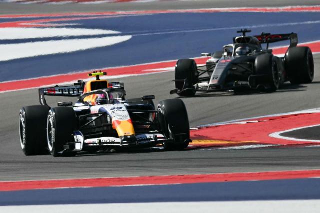 (L/R) Racing Bulls' New Zealand driver Liam Lawson and Audi's German driver Nico Hulkenberg race during a practice session for the United States Formula One Grand Prix at the Circuit of the Americas in Austin, Texas, on October 23, 2026. (Photo by ANGELA WEISS / AFP)