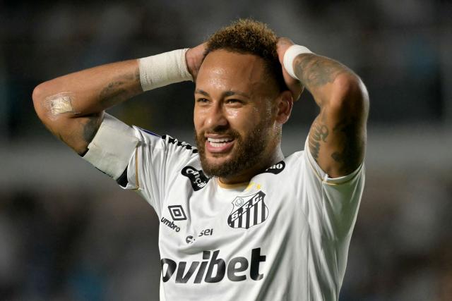 (FILES) Santos' forward #10 Neymar reacts during the second leg of the Copa Sudamericana knockout round play-off football match between Brazil's Santos and Venezuela's Universidad Central at the Urbano Caldeira stadium, in Santos, state of Sao Paulo, Brazil, on July 28, 2026. Brazilian football star Neymar on October 23, 2026, threw his support behind right-wing senator Flavio Bolsonaro ahead of a tight runoff election against leftist incumbent Luiz Inacio Lula da Silva. (Photo by NELSON ALMEIDA / AFP)