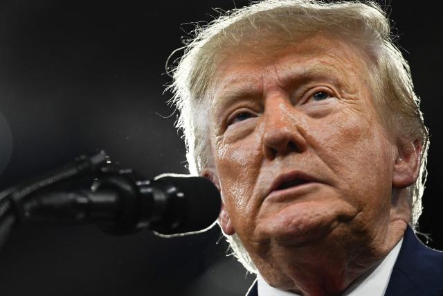 US President Donald Trump speaks during a campaign rally at the Alico Arena, Florida Gulf Coast University in Fort Myers, Florida on October 23, 2026. (Photo by Brendan SMIALOWSKI / AFP)