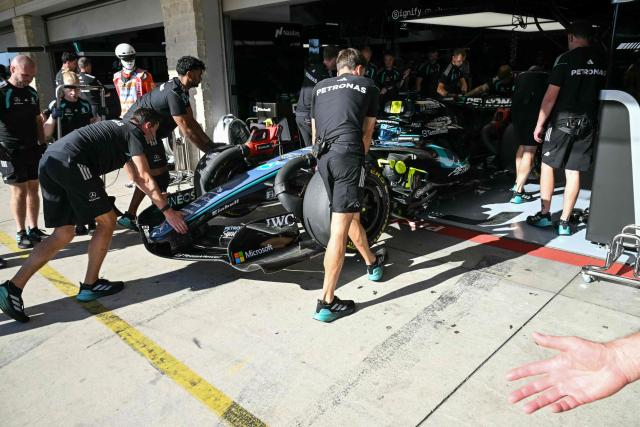Mercedes' British driver George Russell returns to his garage during the second practice session for the United States Formula One Grand Prix at the Circuit of the Americas in Austin, Texas, on October 23, 2026. (Photo by RONALDO SCHEMIDT / AFP)