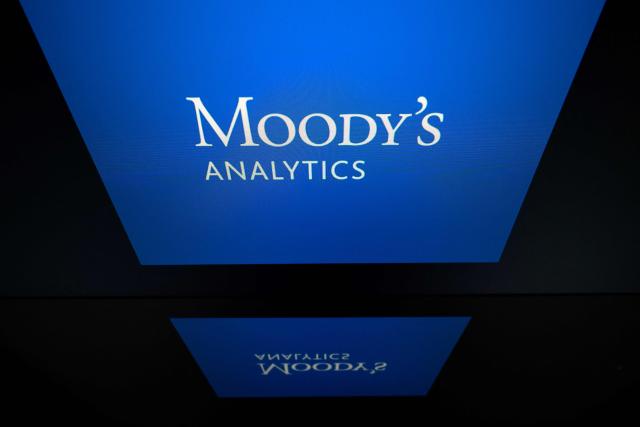 (FILES) This illustration photograph taken in Toulouse on March 18, 2025, shows a screen displaying the logo of the rating agency Moody's Analytics. Moody's agency abstained on October 23, 2026 from any rating action on French debt, effectively maintaining its assessment at Aa3 with a negative outlook. (Photo by Lionel BONAVENTURE / AFP)