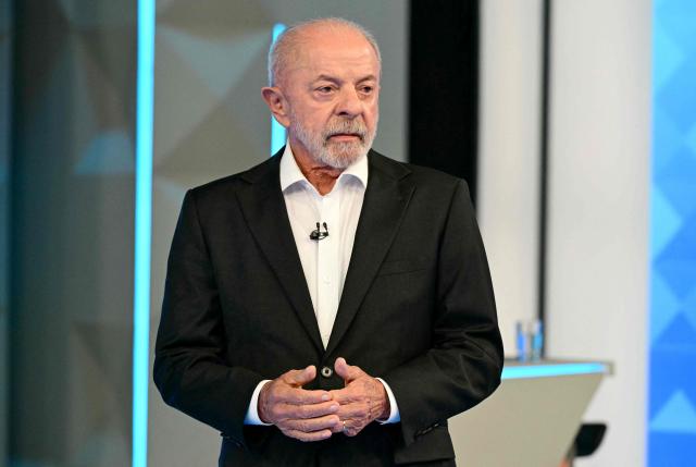Brazil's President and presidential candidate Luiz Inacio Lula da Silva takes part in a presidential debate against Brazil's right-wing presidential candidate Flavio Bolsonaro ahead of the election runoff in Rio de Janeiro, Brazil, on October 23, 2026. (Photo by Pablo PORCIUNCULA / AFP)