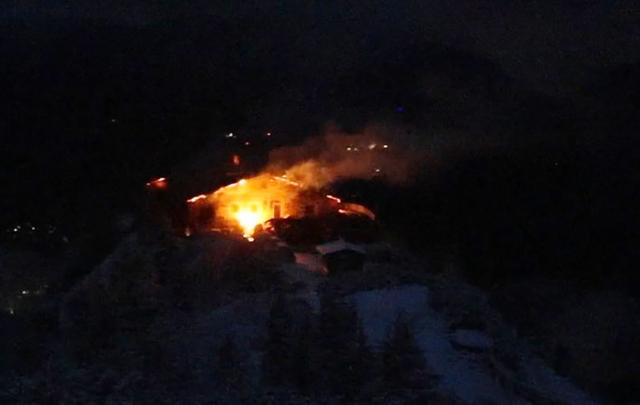 Video grab taken from the webcam of the mountain guesthouse Kehlsteinhaus, known as the Eagle's Nest, formerly Adolf Hitler's mountain retreat, on early October 24, 2026, after a large fire had broken out at the site located at an altitude of 1,834 metres (6,000 feet) in the mountains over Berchtesgaden, in the southern German state of Bavaria. Emergency services arrived on site on late October 23, 2026 and found a large fire. German police said on October 24, 2026 they have detained a suspect following a fire at Adolf Hitler's mountain retreat, known as the Eagle's Nest. (Photo by Berchtesgaden / AFP)