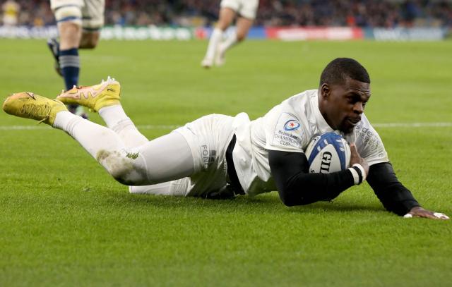 (FILES) Racing 92's English wing Christian Wade scores a try during the European Champions Cup Pool A rugby union match between Leinster and Racing 92 at Aviva Stadium in Dublin, Ireland on January 21, 2023. Christian Wade enjoyed another landmark moment in an extraordinary multi-sport career when he equalled Chris Ashton's all-time English Prem record of 101 tries as Newcastle beat Sale 17-9 on Friday for their first league win of the season. (Photo by PAUL FAITH / AFP)
