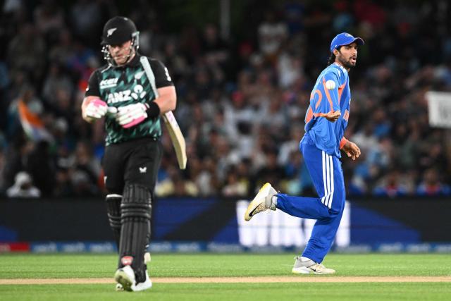 India's Tilak Varma (R) celebrates after taking the catch to dismiss New Zealand's Tim Seifert during the second Twenty20 international cricket match between New Zealand and India at Hagley Oval in Christchurch on October 24, 2026. (Photo by Sanka VIDANAGAMA / AFP)