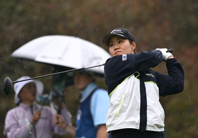 Nasa Hataoka of Japan tees off on the 6th hole during the third round of the LPGA Tour - BMW Ladies Championship golf tournament at Pine Beach Golf Links in Haenam on October 24, 2026. (Photo by Jung Yeon-je / AFP)