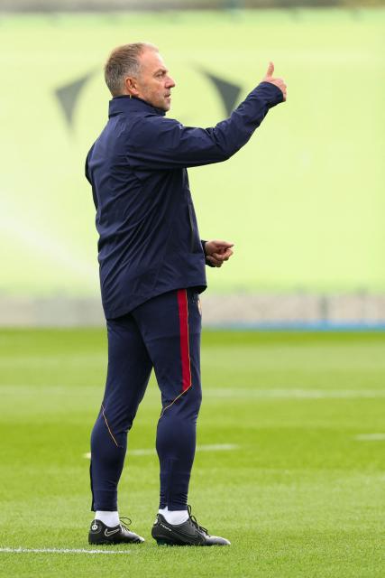 Barcelona's German coach Hans-Dieter Flick gestures during a training session on the eve of their Spanish league "Clasico" football match against Real Madrid CF at the Joan Gamper training ground in Sant Joan Despi, near Barcelona, on October 24, 2026 (Photo by Lluis GENE / AFP)