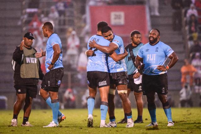 Fiji players celebrate their victory after an international test match between Japan and Fiji at the Prince Chichibu Memorial Rugby Ground in Tokyo on October 24, 2026. (Photo by Yuichi YAMAZAKI / AFP)