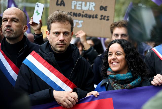 (From L) French leftist party La France Insoumise (LFI) group MP Manuel Bompard, French leftist party La France Insoumise (LFI) group MP Paul Vannier and France's left-wing party La France Insoumise (LFI) member of European Parliament Manon Aubry take part in a demonstration in favor of purchasing power, the protection of public services, and fiscal and social justice, in Paris on October 24, 2026 as part of a nationwide call for mobilisation bringing together former members of the Yellow Vest movement, labor unions, high school and university students. Protests by high school students over learning conditions sparked a movement that has since spread nationwide, fuelled by broader anger over the rising cost of living. About 70,000 security personnel will be deployed on October 24, 2026, Interior Minister said at a news conference, warning that calls for violence and looting were circulating on social media. (Photo by Sameer AL-DOUMY / AFP)