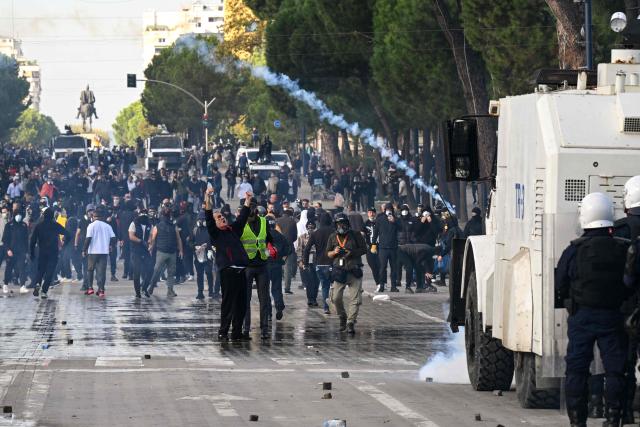 Protesters clash with riot police during a national anti-government demonstration - called by the student-led protest movement to demand better support for education and prime minister's resignation, in central Tirana on October 24, 2026. (Photo by Armend NIMANI / AFP)