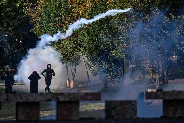 Protesters clash with riot police during a national anti-government demonstration - called by the student-led protest movement to demand better support for education and prime minister's resignation, in central Tirana on October 24, 2026. (Photo by Armend NIMANI / AFP)