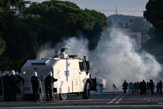 Riot police operates to disperse protesters during a national anti-government demonstration - called by the student-led protest movement to demand better support for education and prime minister's resignation, in central Tirana on October 24, 2026. (Photo by Armend NIMANI / AFP)