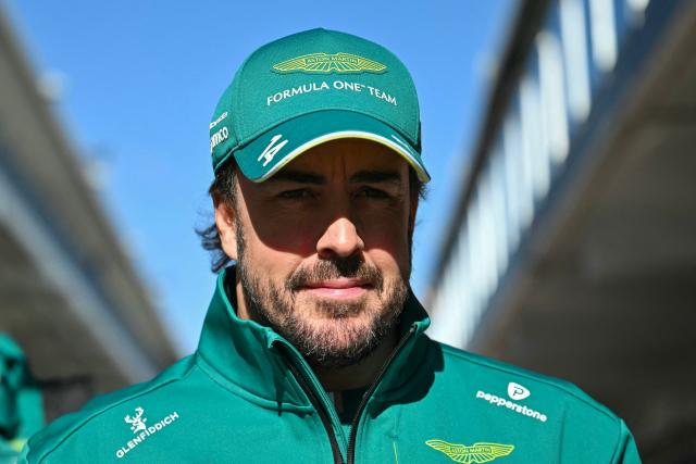 Aston Martin's Spanish driver Fernando Alonso arrives in the paddock ahead of the final practice session for the United States Formula One Grand Prix at the Circuit of the Americas in Austin, Texas, on October 24, 2026. (Photo by ANGELA WEISS / AFP)