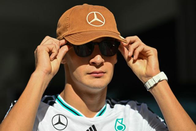 Mercedes' British driver George Russell puts on sunglasses as he arrives in the paddock ahead of the final practice session for the United States Formula One Grand Prix at the Circuit of the Americas in Austin, Texas, on October 24, 2026. (Photo by ANGELA WEISS / AFP)