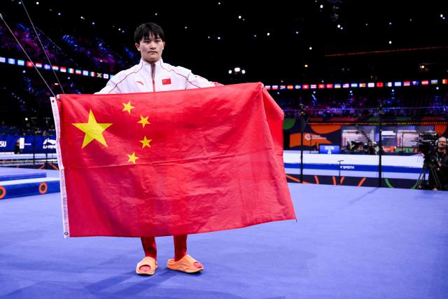 China's Xingyu Lan celebrates after winning the Men's Rings Final during the 54th FIG Artistic Gymnastics World Championships, in Rotterdam, southern Netherlands, on October 24, 2026. (Photo by JOHN THYS / AFP)
