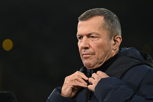 Former German football player Lothar Matthaeus makes the pre-match pitch-side report for TV prior to the German first division Bundesliga football match between BVB Borussia Dortmund and Eintracht Frankfurt in Dortmund, western Germany on October 24, 2026. (Photo by INA FASSBENDER / AFP) / DFL REGULATIONS PROHIBIT ANY USE OF PHOTOGRAPHS AS IMAGE SEQUENCES AND/OR QUASI-VIDEO