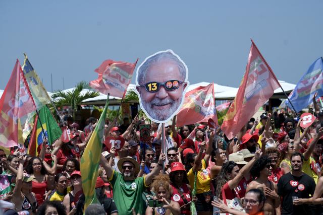 Supporters of Brazil's President and presidential candidate Luiz Inacio Lula da Silva of the Workers' Party (PT) attend a rally on Copacabana beach in Rio de Janeiro, Brazil, on October 24, 2026, ahead of the presidential election runoff. (Photo by TERCIO TEIXEIRA / AFP)