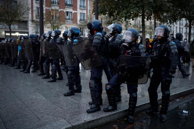 French Gendarmes operate during a demonstration in favor of purchasing power, the protection of public services, and fiscal and social justice, in Paris on October 24, 2026 as part of a nationwide call for mobilisation bringing together former members of the Yellow Vest movement, labor unions, high school and university students. Protests by high school students over learning conditions sparked a movement that has since spread nationwide, fuelled by broader anger over the rising cost of living. About 70,000 security personnel will be deployed on October 24, 2026, Interior Minister said at a news conference, warning that calls for violence and looting were circulating on social media. (Photo by Sameer AL-DOUMY / AFP)
