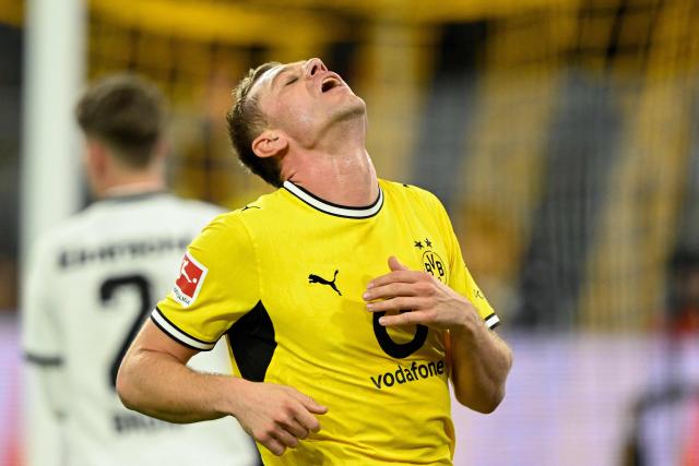 Dortmund's Norwegian defender #26 Julian Ryerson reacts during the German first division Bundesliga football match between BVB Borussia Dortmund and Eintracht Frankfurt in Dortmund, western Germany on October 24, 2026. (Photo by INA FASSBENDER / AFP) / DFL REGULATIONS PROHIBIT ANY USE OF PHOTOGRAPHS AS IMAGE SEQUENCES AND/OR QUASI-VIDEO