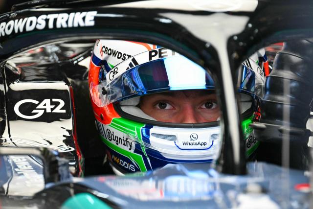 Mercedes' Italian driver Kimi Antonelli sits in his car as he prepares to leave the garage during the final practice session for the United States Formula One Grand Prix at the Circuit of the Americas in Austin, Texas, on October 24, 2026. (Photo by ANGELA WEISS / AFP)