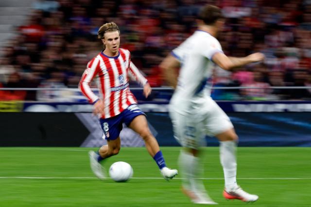 Atletico Madrid's Spanish midfielder #08 Pablo Barrios dribbles the ball during the Spanish league football match between Club Atletico de Madrid and RC Deportivo de la Coruna at Metropolitano Stadium in Madrid on October 24, 2026. (Photo by Oscar DEL POZO / AFP)