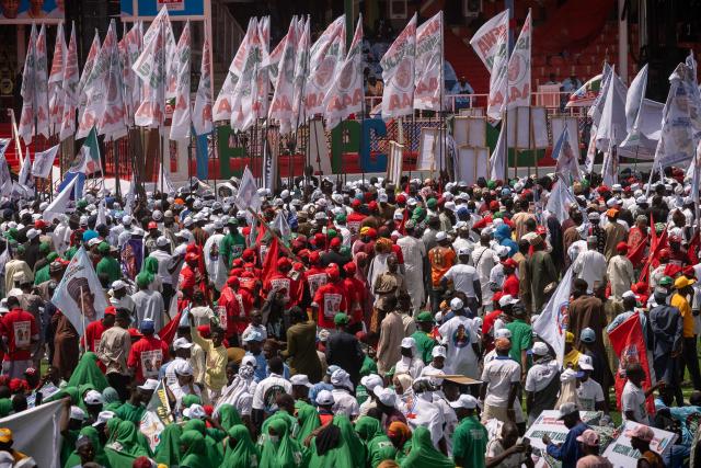 Supporters of the All Progressives Congress (APC) gather during the presidential campaign flag-off rally at the Ranchers Bees stadium in Kaduna, on October 24, 2026. Nigerian President Bola Tinubu launches his re-election campaign on Saturday facing voter anger over insecurity and economic hardships. (Photo by Light Oriye Tamunotonye / AFP)