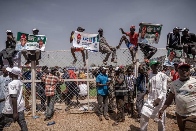 Supporters of the All Progressives Congress (APC) attend the presidential campaign flag-off rally at the Ranchers Bees stadium in Kaduna, on October 24, 2026. Nigerian President Bola Tinubu launches his re-election campaign on Saturday facing voter anger over insecurity and economic hardships. (Photo by Light Oriye Tamunotonye / AFP)