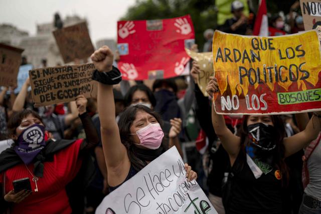 Demonstrators attend a rally called by Gen Z and other sectors to protest against insecurity in Lima on October 24, 2026. (Photo by ERNESTO BENAVIDES / AFP)
