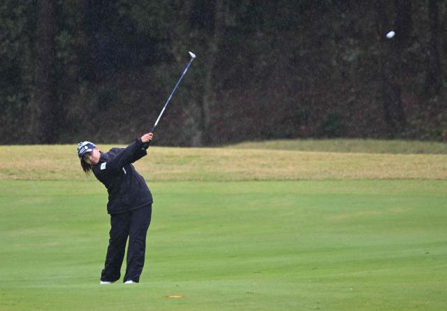 Chanettee Wannasaen of Thailand plays a shot on the 5th hole during the final round of the LPGA Tour - BMW Ladies Championship golf tournament at Pine Beach Golf Links in Haenam on October 25, 2026. (Photo by Jung Yeon-je / AFP)