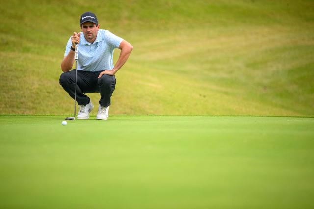 South Africa's Casey lines up a putt during the DP World Tour Genesis Championship golf tournament in Cheonan city on October 25, 2026. (Photo by Philip FONG / AFP)
