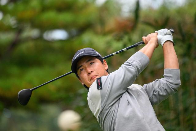 Japan's Yuto Katsuragawa plays a tee shot during the DP World Tour Genesis Championship golf tournament in Cheonan city on October 25, 2026. (Photo by Philip FONG / AFP)