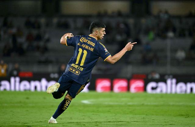 Tigres' Argentine midfielder #11 Juan Brunetta celebrates after scoring the equalising goal during the Liga MX Apertura tournament football match between Pumas and Tigres at the Olimpico Universitario stadium in Mexico City on October 24, 2026. (Photo by Yuri CORTEZ / AFP)
