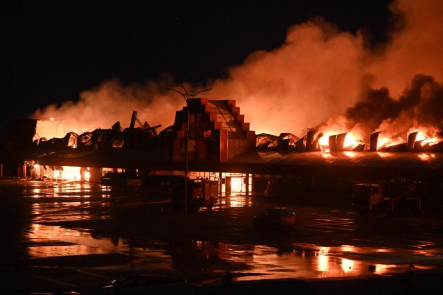 This photograph shows the Epicentr hypermarket that was damaged following a Russian air attack, in Kharkiv, late on October 24, 2026, amid the Russian invasion of Ukraine. (Photo by SERGEY BOBOK / AFP)