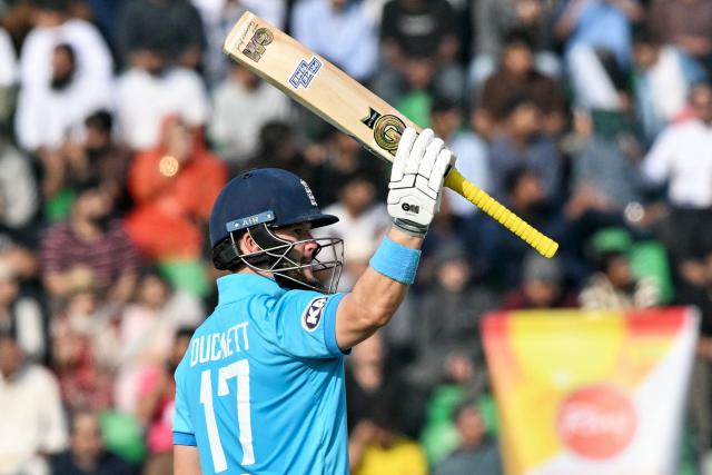 England's Ben Duckett celebrates after scoring a half-century (50 runs) during the one-day international (ODI) tri-series cricket match between Pakistan and England at the Gaddafi Stadium in Lahore on October 25, 2026. (Photo by ARIF ALI / AFP)