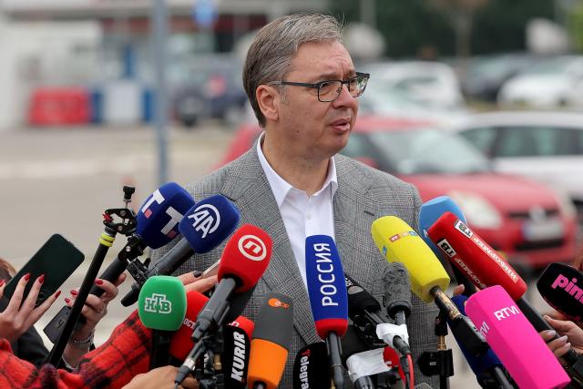 Former Serbian president Aleksandar Vucic, the Serbian Progressive Party (SNS) candidate for prime minister, speaks to the press after voting outside a polling station in Belgrade on October 25, 2026, during the country's snap parliamentary elections. The vote is the culmination of nearly two years of student-led protests sparked by the 2024 collapse of a canopy at Novi Sad railway station that killed 16 people, a tragedy widely blamed on corruption. (Photo by Pedja Milosavljevic / AFP)
