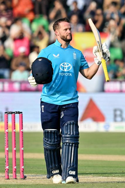 England's Ben Duckett celebrates after scoring a century (100 runs) during the one-day international (ODI) tri-series cricket match between Pakistan and England at the Gaddafi Stadium in Lahore on October 25, 2026. (Photo by ARIF ALI / AFP)