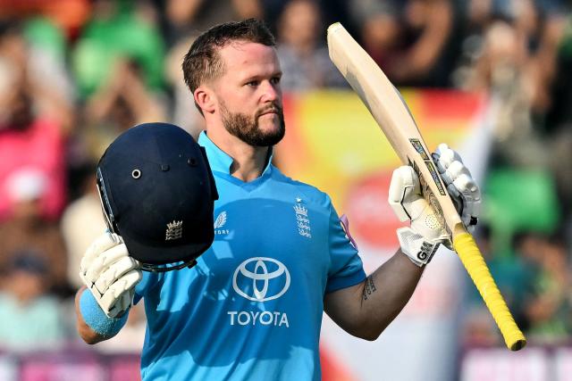 England's Ben Duckett celebrates after scoring a century (100 runs) during the one-day international (ODI) tri-series cricket match between Pakistan and England at the Gaddafi Stadium in Lahore on October 25, 2026. (Photo by ARIF ALI / AFP)