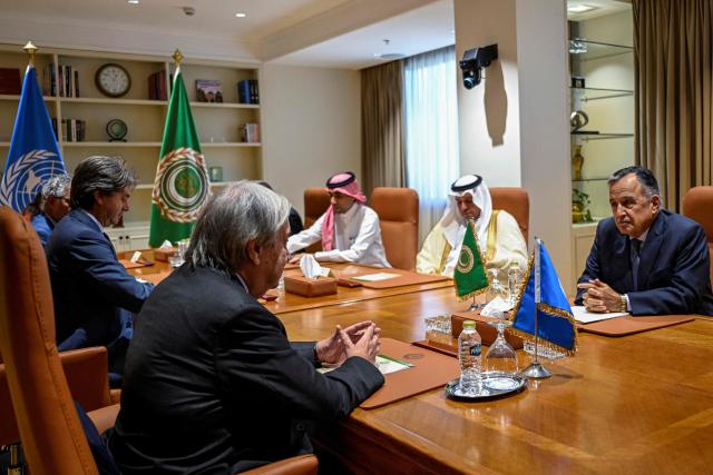 UN Secretary-General Antonio Guterres (front L) meets with Arab League Secretary-General Nabil Fahmy (R) at the Arab League's headquarters in Cairo on October 25, 2026. (Photo by Khaled DESOUKI / AFP)