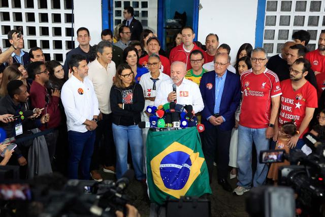 Brazil's President and re-election candidate for the Workers' Party (PT) Luiz Inacio Lula da Silva speaks after casting his vote during the presidential runoff election, at a polling station in Sao Bernardo do Campo, state of Sao Paulo, Brazil, on October 25, 2026. Lula da Silva faces right-wing senator Flavio Bolsonaro in a runoff that will determine whether Brazil remains one of the few leftist nations in the region or joins a regional swing to the right championed by US President Donald Trump, Bolsonaro's ally. (Photo by Miguel SCHINCARIOL / AFP)