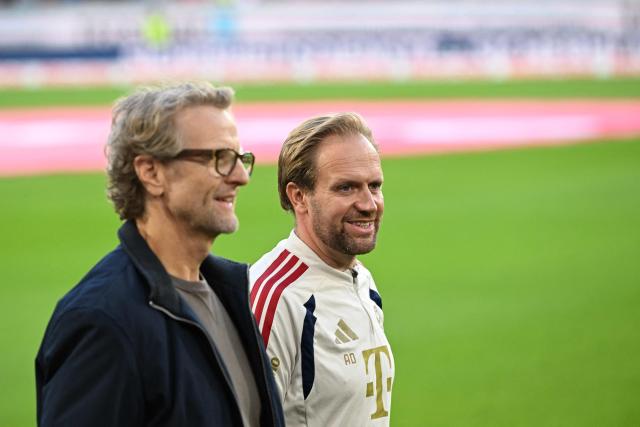 Bayern Munich's English Head Coach Aaron Danks (R) reacts during an interview prior to the German first division Bundesliga football match between SC Freiburg and FC Bayern Munich in Freiburg, south-western Germany, on October 25, 2026. (Photo by THOMAS KIENZLE / AFP) / DFL REGULATIONS PROHIBIT ANY USE OF PHOTOGRAPHS AS IMAGE SEQUENCES AND/OR QUASI-VIDEO