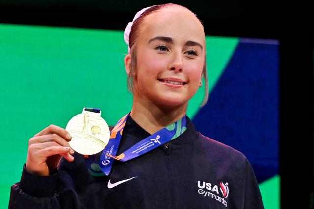 US' Claire Pease celebrates on the podium after the Women's Floor Exercise Final during the 54th FIG Artistic Gymnastics World Championships, in Rotterdam, southern Netherlands, on October 25, 2026. (Photo by JOHN THYS / AFP)