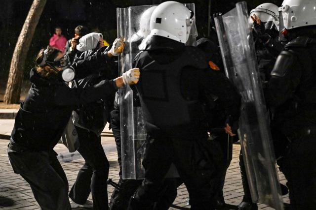 Protesters clash with riot police during an anti-government demonstration - called by the student-led protest movement to denounce poor study conditions and corruption and to demand prime minister's resignation, in central Tirana on October 25, 2026. (Photo by Armend NIMANI / AFP)