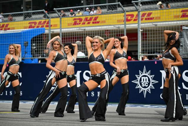 San Antonio Spurs cheerleaders perform ahead of the drivers' parade before the start of the United States Formula One Grand Prix at the Circuit of the Americas in Austin, Texas, on October 25, 2026. (Photo by ANGELA WEISS / AFP)