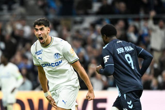 Marseille's defender #21 Nayef Aguerd celebrates after scoring during the French L1 football match between Olympique de Marseille (OM) and Havre Athletic Club (HAC) at the Stade Velodrome in Marseille, southern France, on October 25, 2026. (Photo by Justine Meddah / AFP)